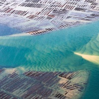 Survol en ULM: parcs à huitres bien visibles dans le bassin d'Arcachon à marée basse
