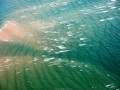 Survol en ULM: les vagues se fracassent sur le banc de sable