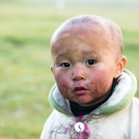 Plateau de Son Kul: portrait d'enfant nomade