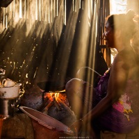 Scène de vie dans un village: dans la cuisine