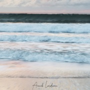 Vagues au coucher de soleil
