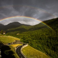 Double arc-en-ciel sur la route des Mosses